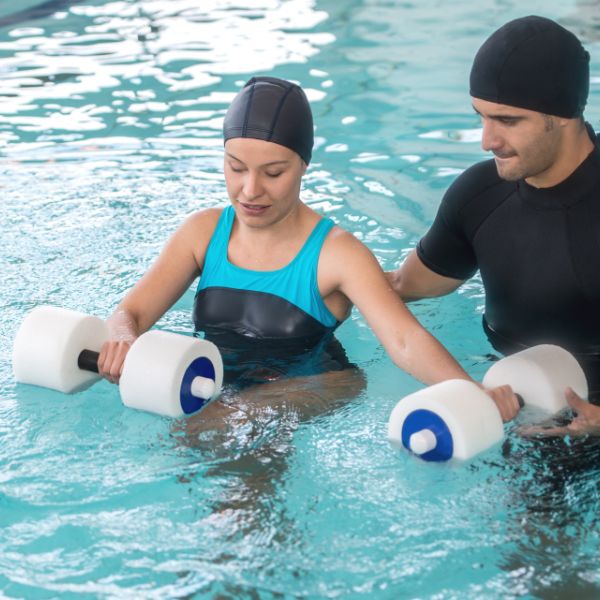 How does hydrotherapy work? Girl having hydrotherapy with physiotherapist